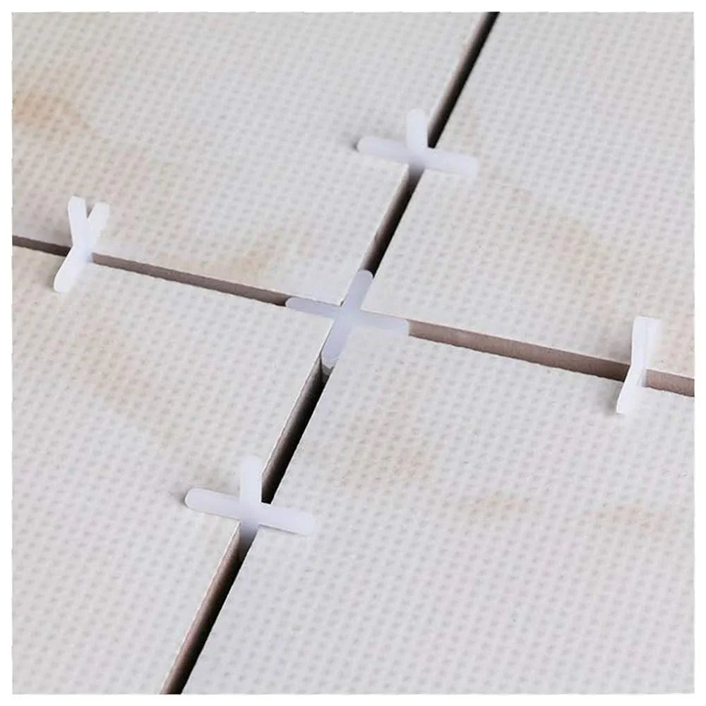 100pièces Spacers de carrelage 1mm en plastique blanc - Adaptés pour les carreaux de céramique de sol et de mur avec des espaces en forme de croix, des joints de coulis réguliers, une installation facile, un design durable et flexible.